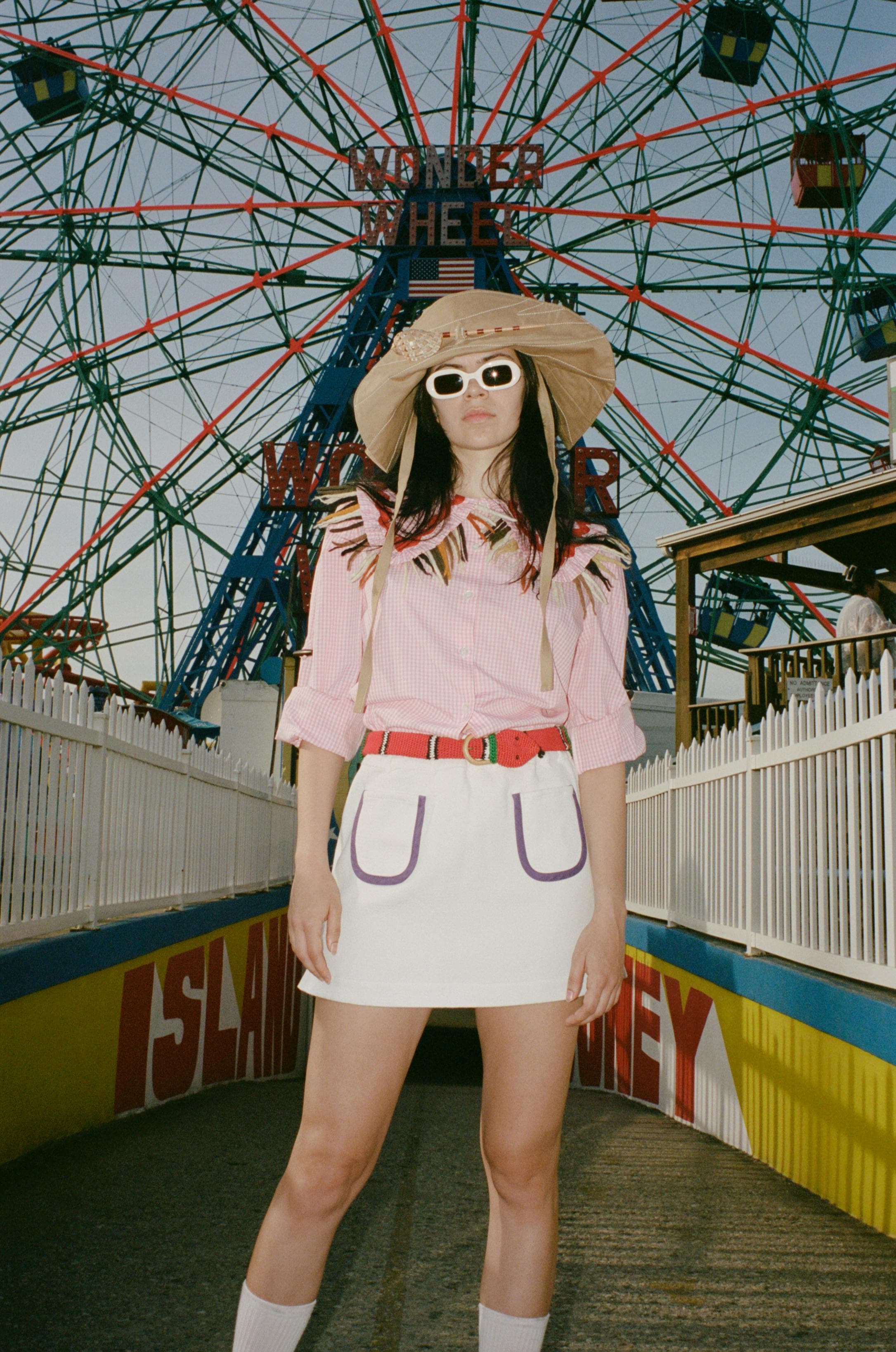 clothing skirt blouse person wheel shorts face handbag amusement park theme park